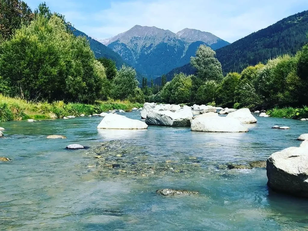 Immagine - "Trentino Dolomites, fishing in clear rapid waters and panoramic scenery"